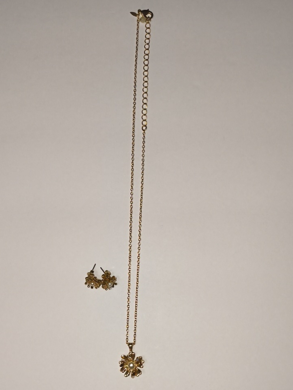 Delicate Gold Flower Pendant Necklace with Matching Earrings